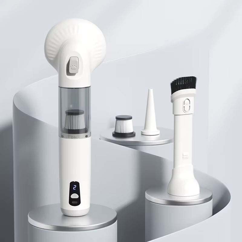 Gray cordless pet grooming vacuum with attachments