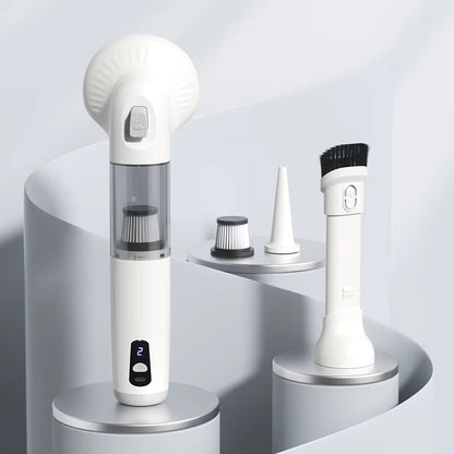 Gray cordless pet grooming vacuum with attachments